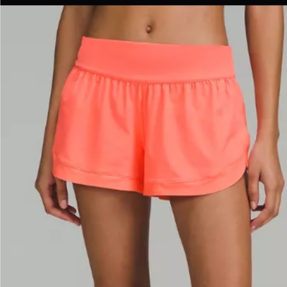 Pink Lululemon calm tides running shorts size 4